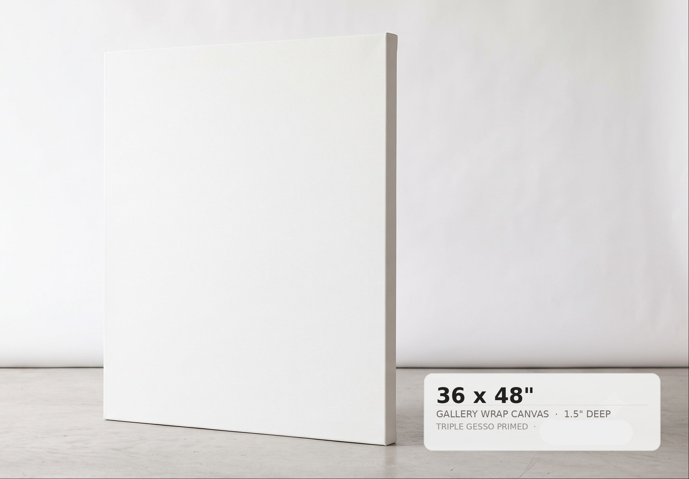 A blank white gallery wrap canvas standing upright on a light gray floor against a white wall, with a size label in the lower right reading 36 x 48 inches.