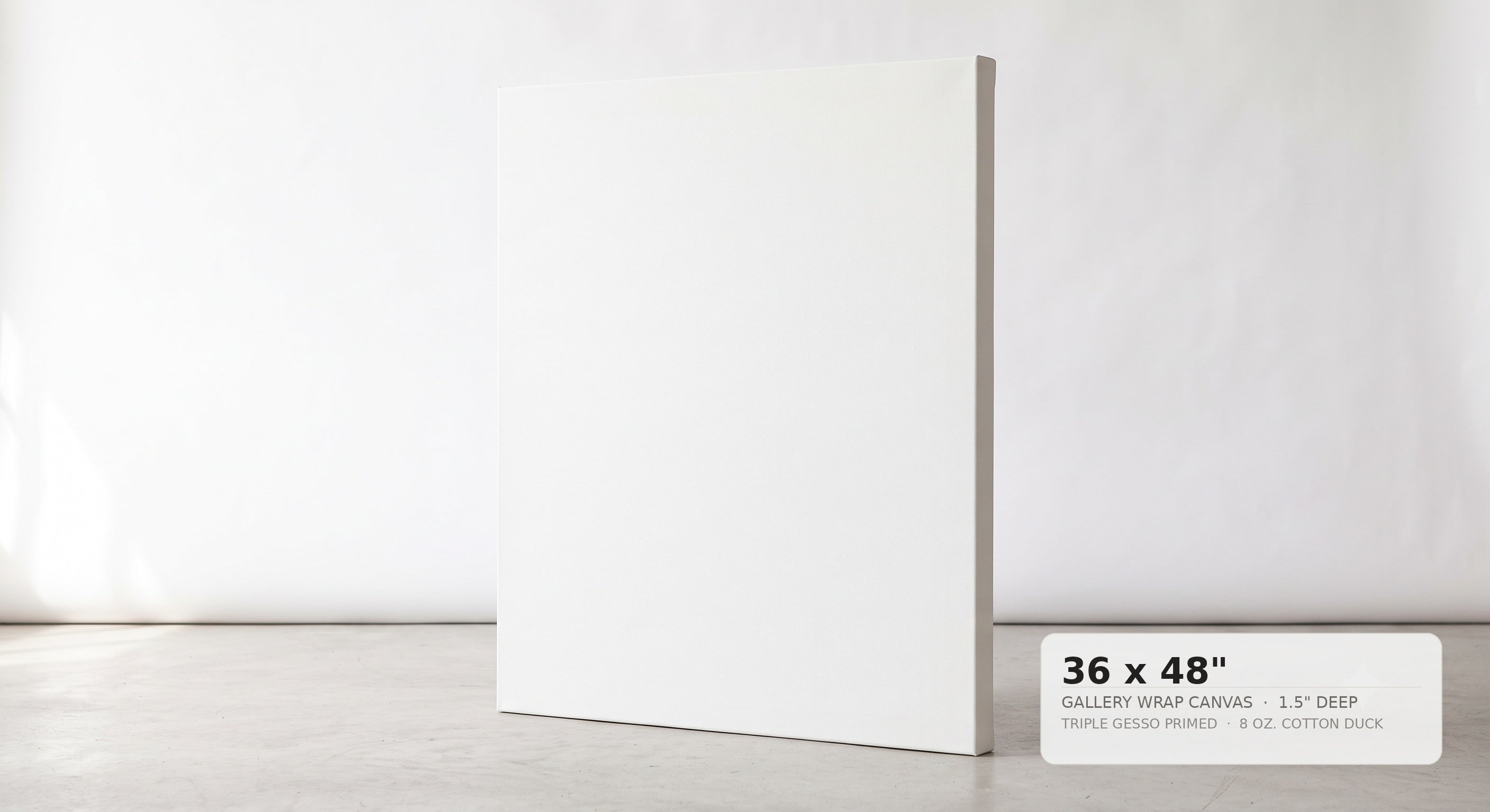 A blank white gallery wrap canvas standing upright on a light gray floor against a white wall, with a size label in the lower right reading 36 x 48 inches.